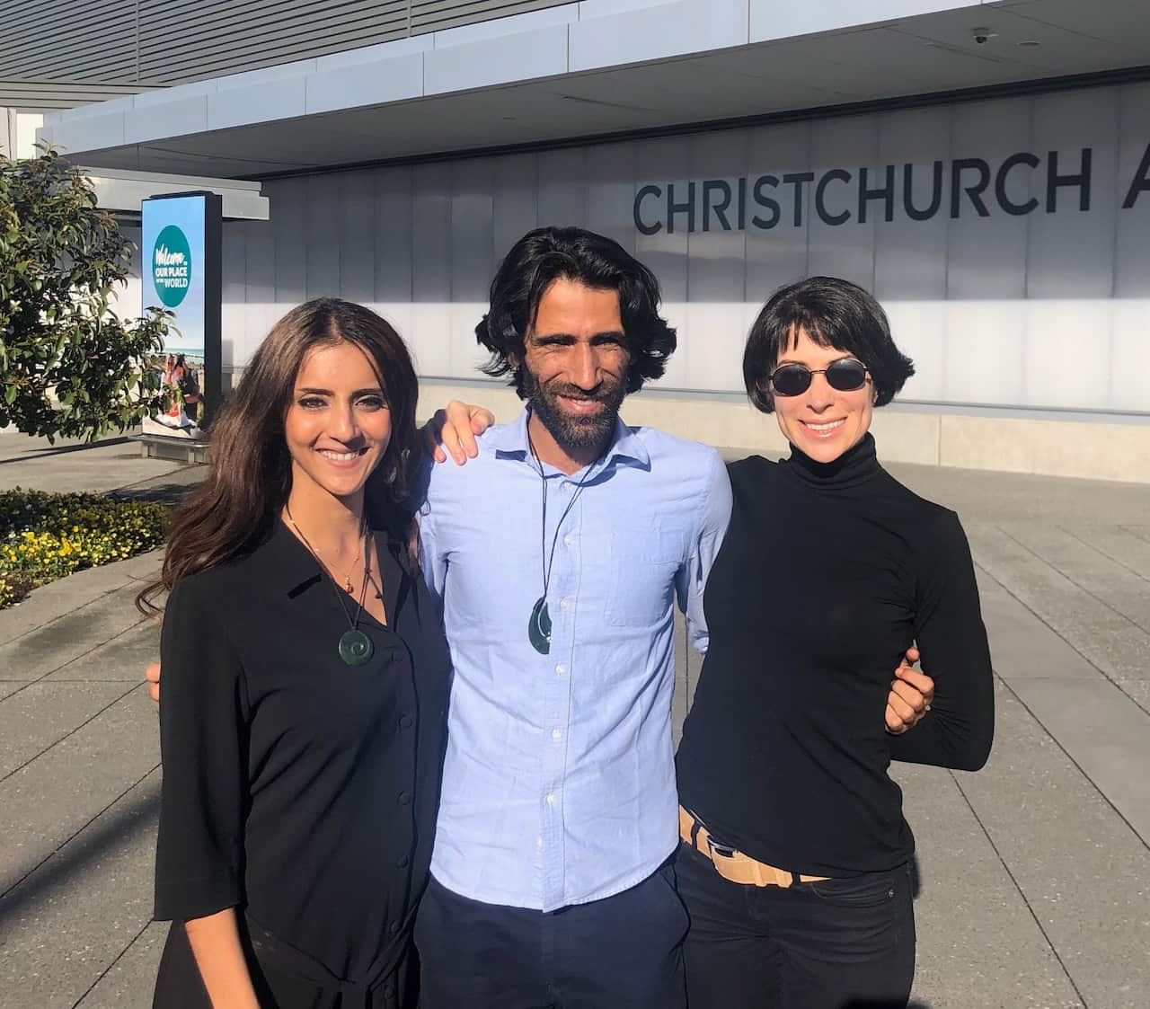 Behrouz Boochani is welcomed in New Zealand by Greens MP Golriz Ghahraman (left) and writer Donna Miles-Mojab. 