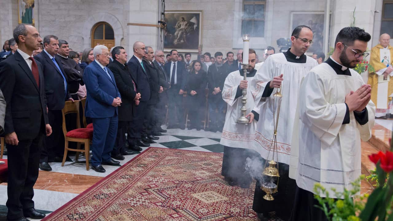 Palestinian President Mahmoud Abbas, attends a Christmas midnight mass at Saint Catherine's Church, in the Church of the Nativity, Bethlehem.