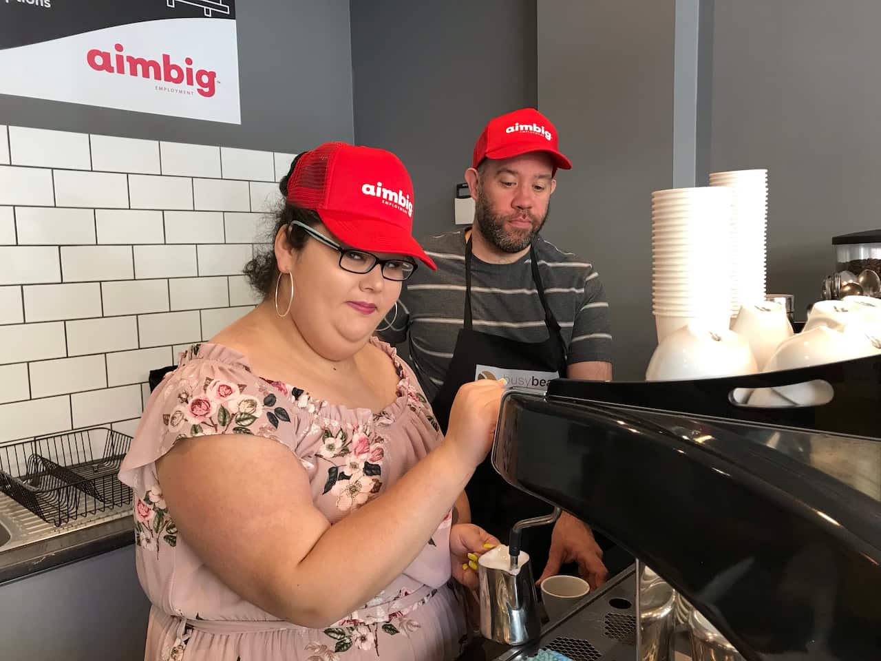 Bianca Ward and Andrew Kenny make coffee