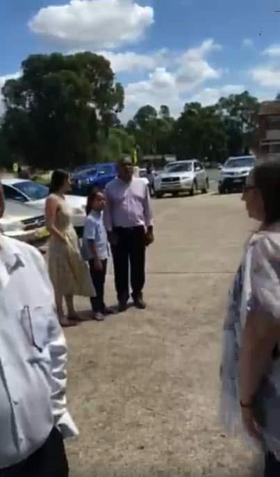 Relatives can be seen watching on outside the Bidwill Hotel.