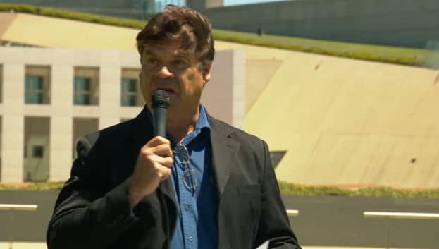 Bill Collins speaks outside Parliament House.