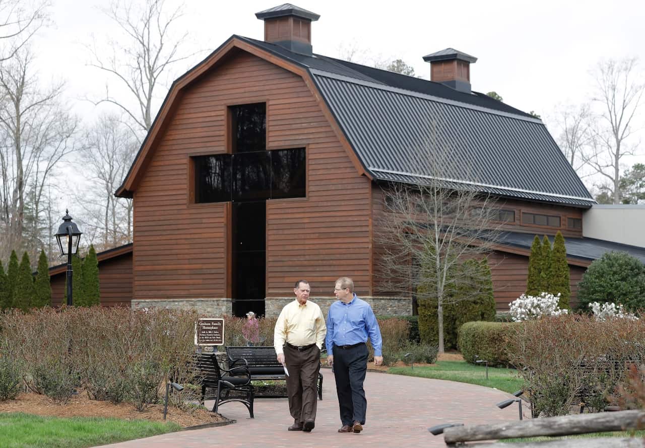 Visitors leave the Billy Graham Library in Charlotte, N.C., Wednesday, Feb. 21, 2018.