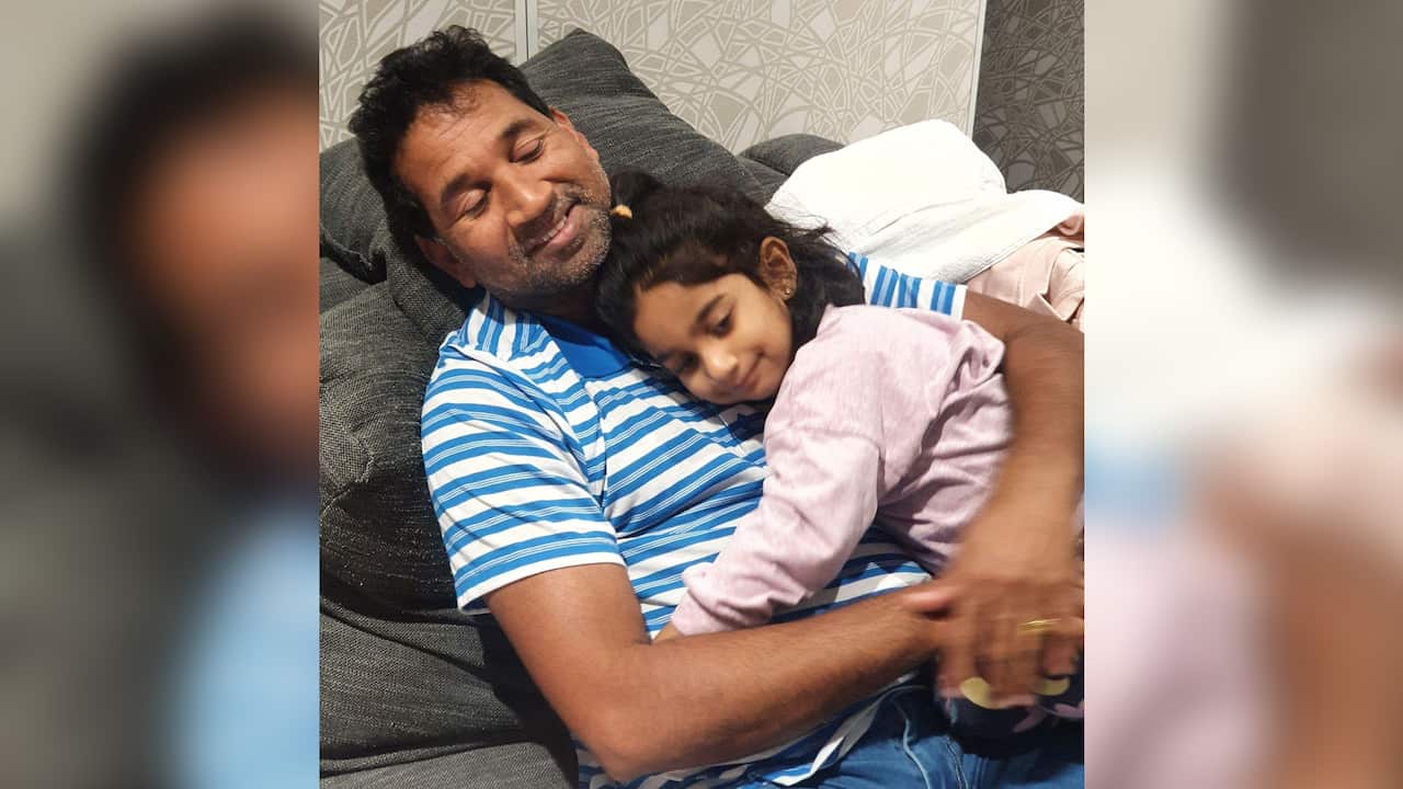 Father Nades and Tharnicaa Murugappan.