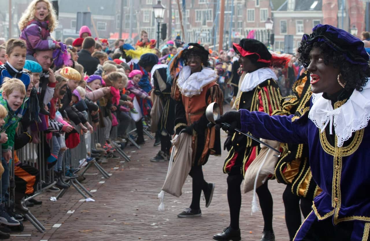 The Dutch version of Santa Claus, Sinterklaas, or Saint Nicholas, and his blackface sidekicks Zwarte Piet or Black Pete