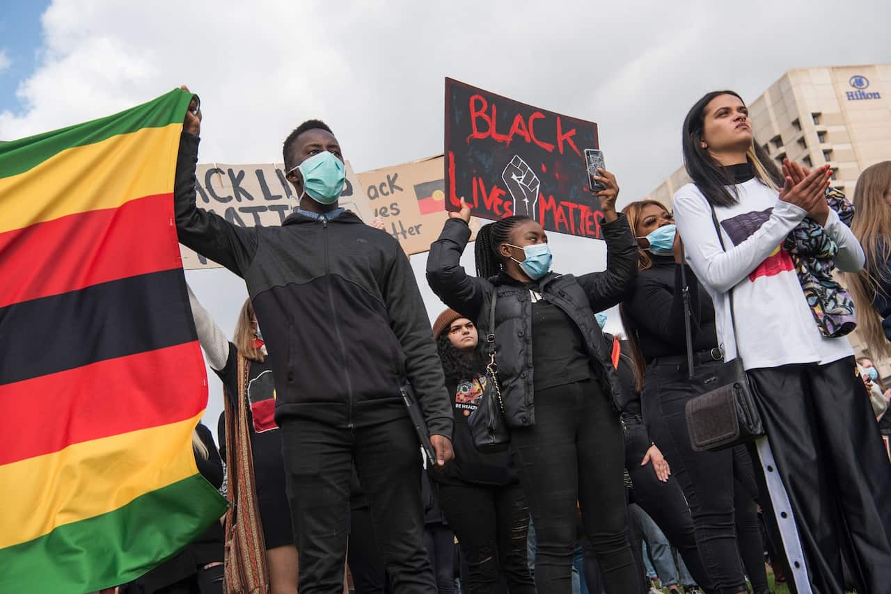 Protesters attend the Black Lives Matter protest at Adelaide's Victoria Square.