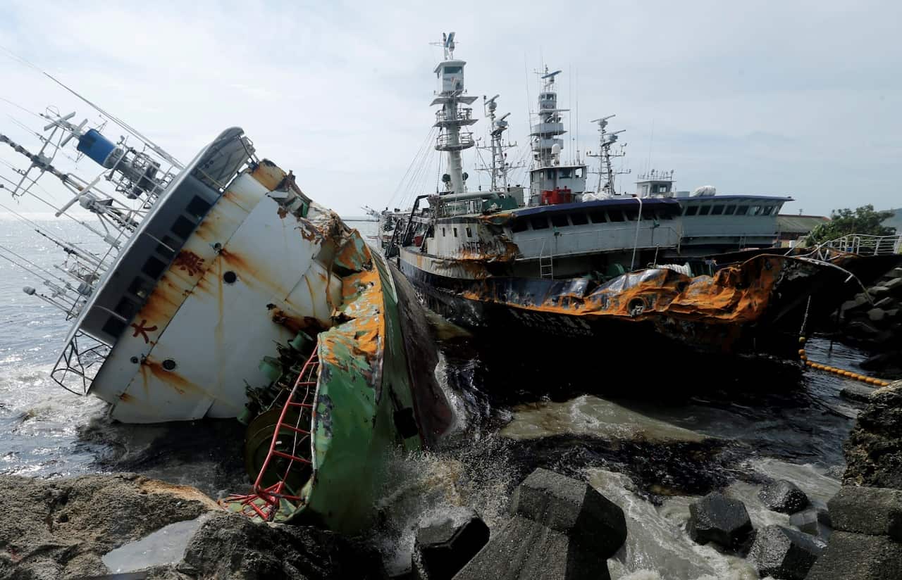 Sinking fishing vessels caused by super typhoon Meranti in Kaohsiung city, southern Taiwan, 15 September 2016.