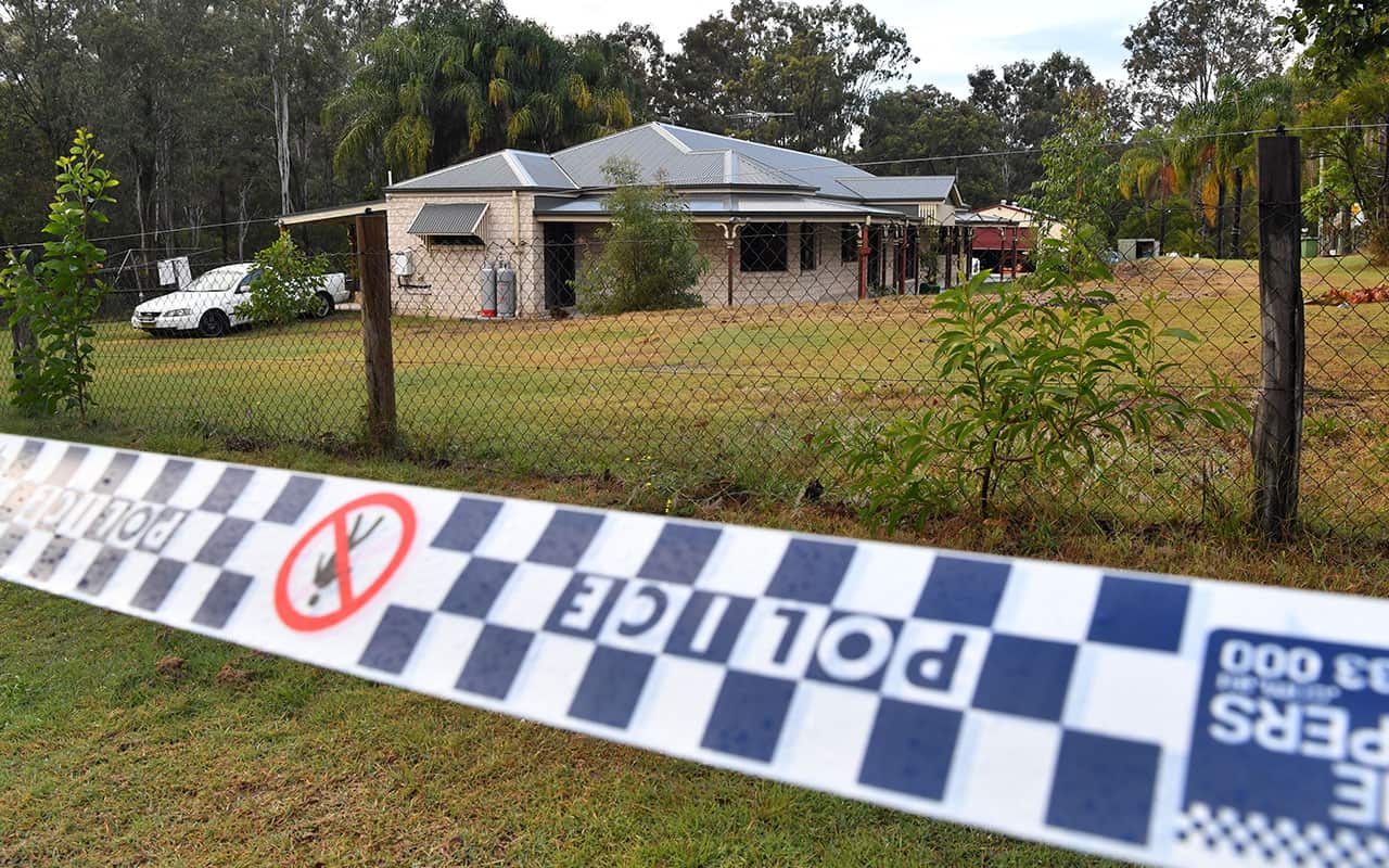 Police tape is seen at a house in Buccan, south of Brisbane.