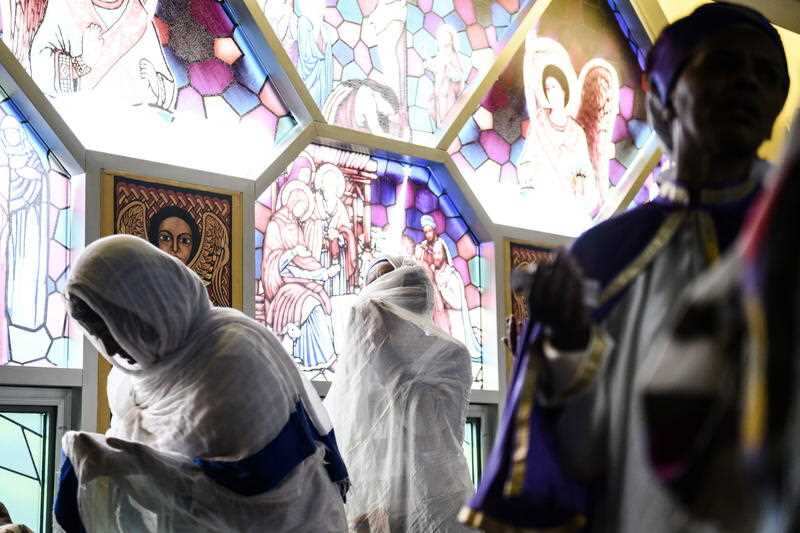 Members of Canada's Ethiopian community take part in a special prayer for the victims of the Ethiopian Airlines flight ET302 crash.