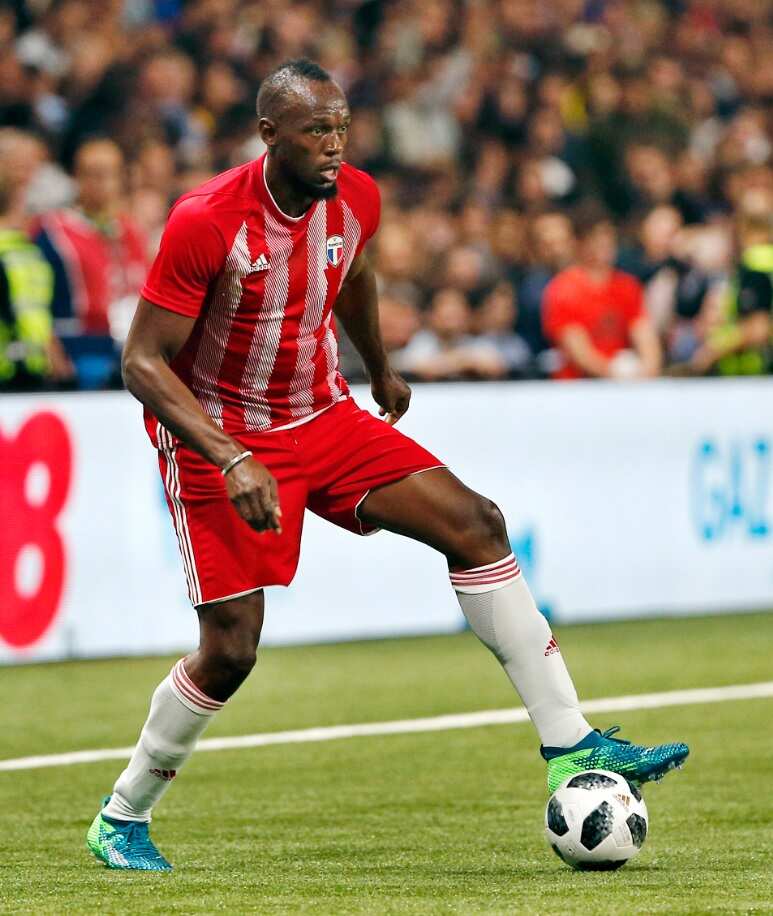File photo, former Olympic and Jamaican sprinter Usain Bolt controls the ball during a charity soccer match