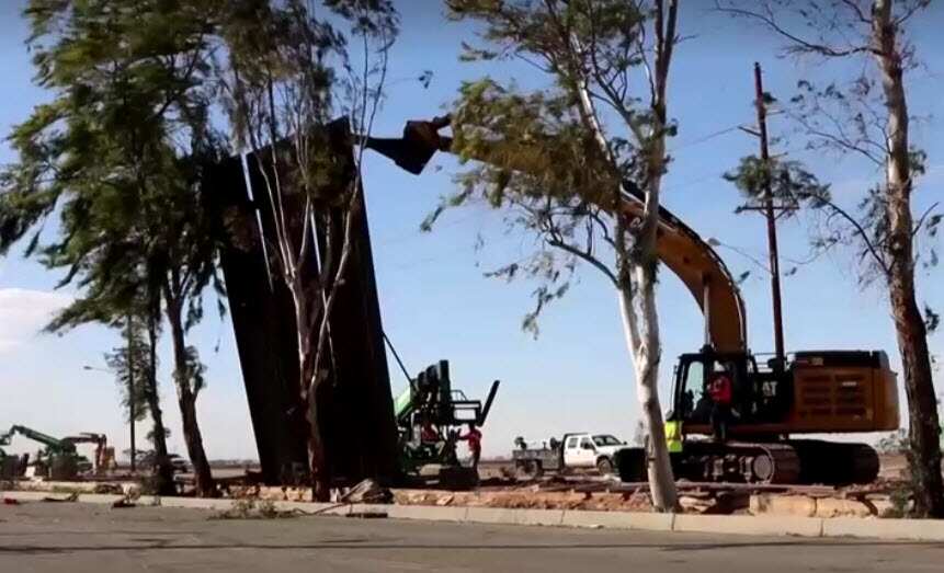 Part of the fallen border wall