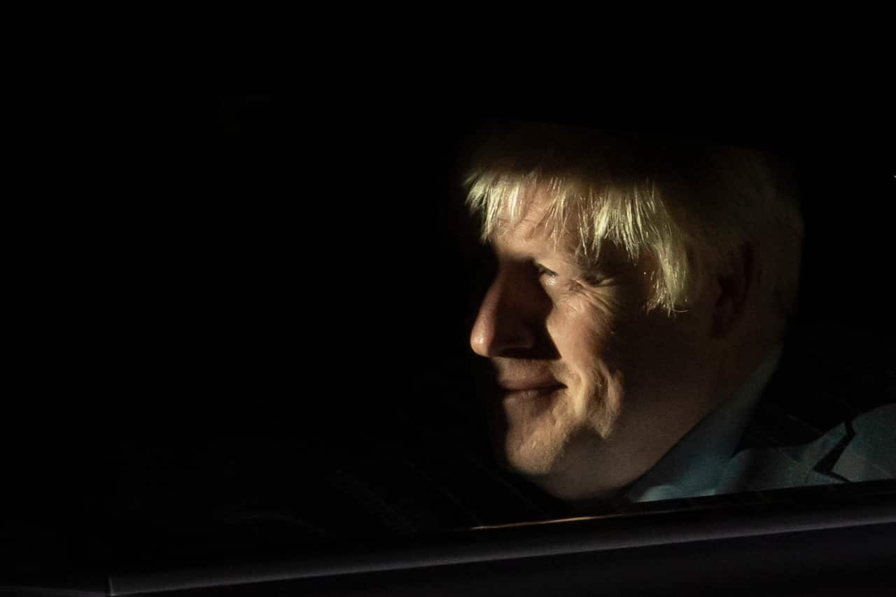 British Prime Minister Boris Johnson leaves the Houses of Parliament after a fiery day.