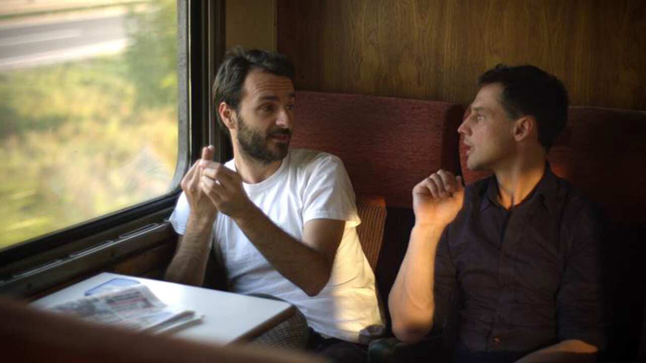 Damir and David on their train journey through Bosnia.