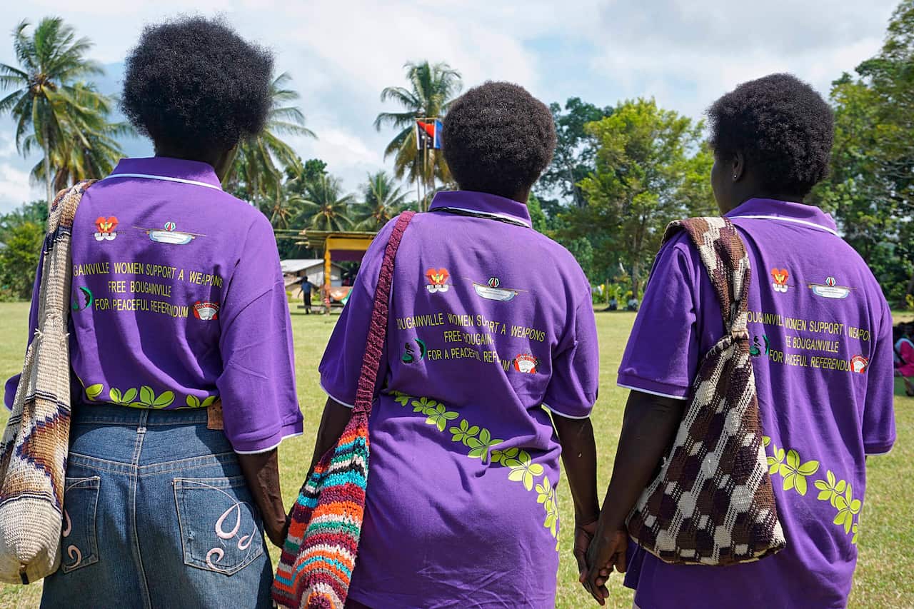 Women in the village of Aero, Bougainville, come together for a unification ceremony last year. The Pacific people of Bougainville are going to the polls.