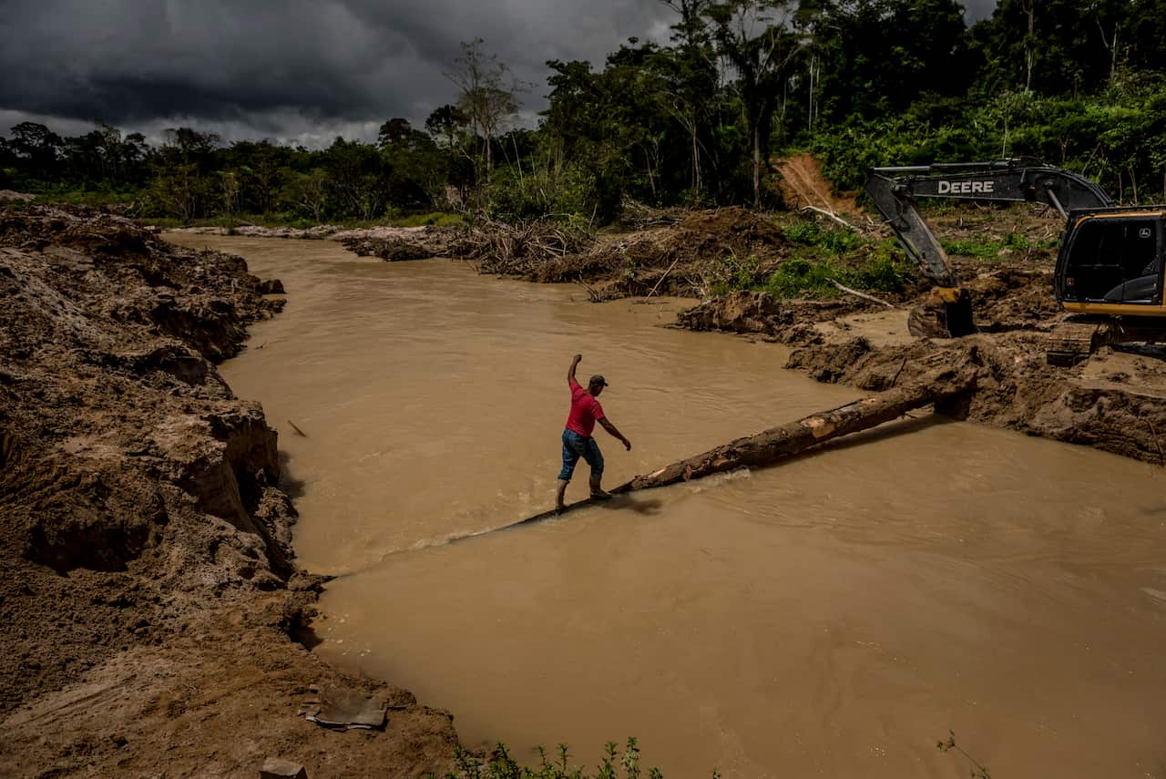 Illegal miners at a gold mine built around Posto de Vigilncia, or Lookout Point, one of the Munduruku tribes most remote villages in the Amazon rainforest in Brazil.
