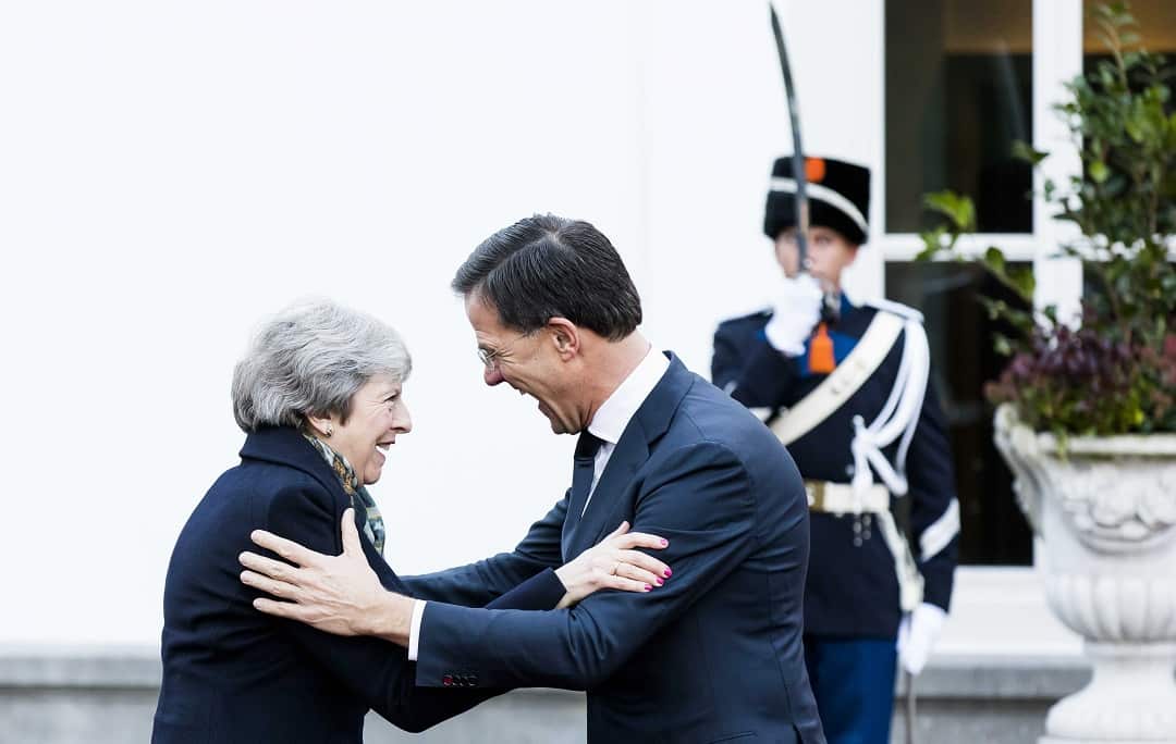 epa07223065 Dutch Prime Minister Mark Rutte (R) welcomes British Prime Minister Theresa May for a working breakfast at the Catshuis, in The Hague, The Netherlands, 11 December 2018.  EPA/BART MAAT