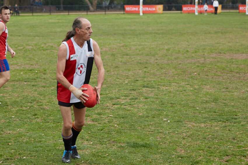 Brian Presnell played AFL as part of his training in the lead up to his first marathon on Sunday.