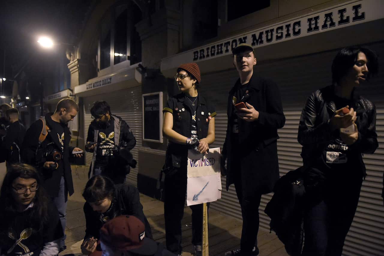 Wetherspoons employees Jess Day and Alex McIntyre during a walkout over fairer pay and better working conditions at the restaurant chain, in Brighton, England. 