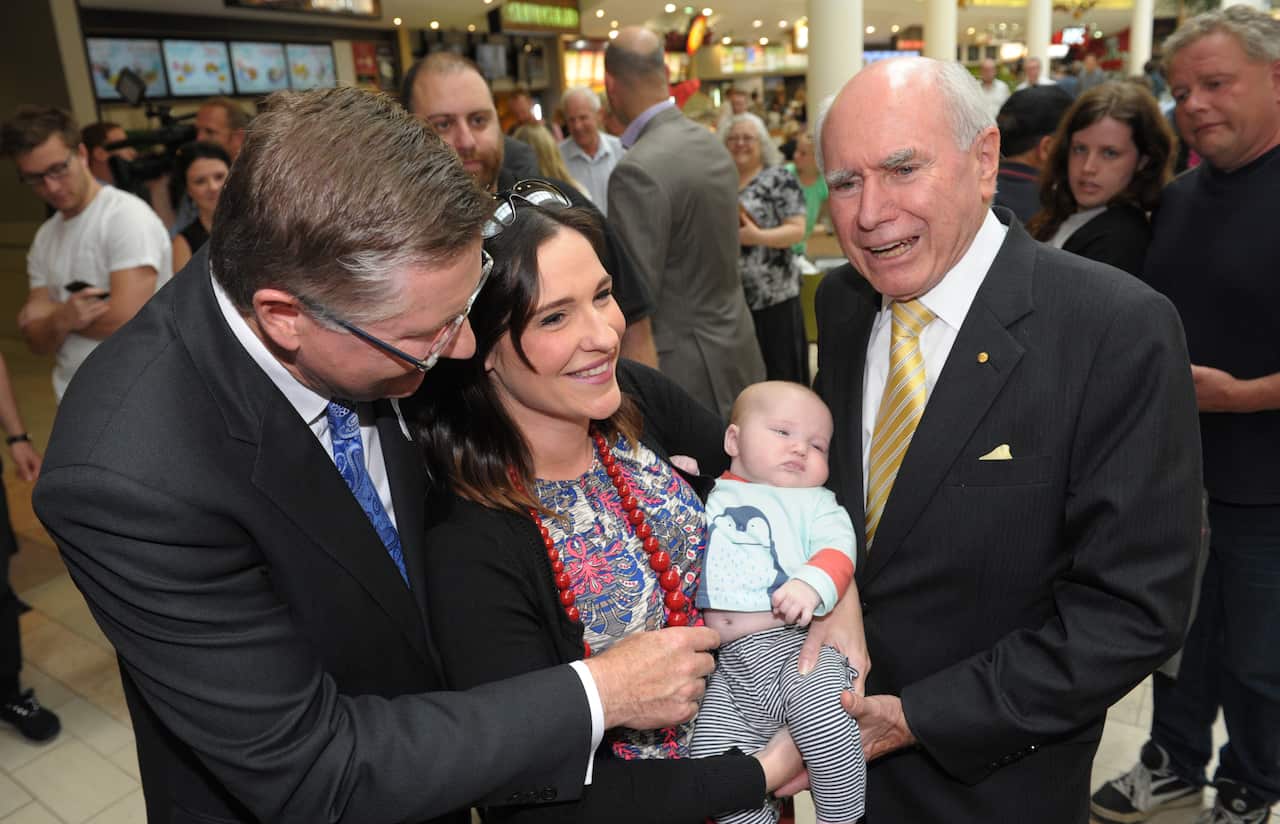 This baby does not care for his distinguished company (AAP)