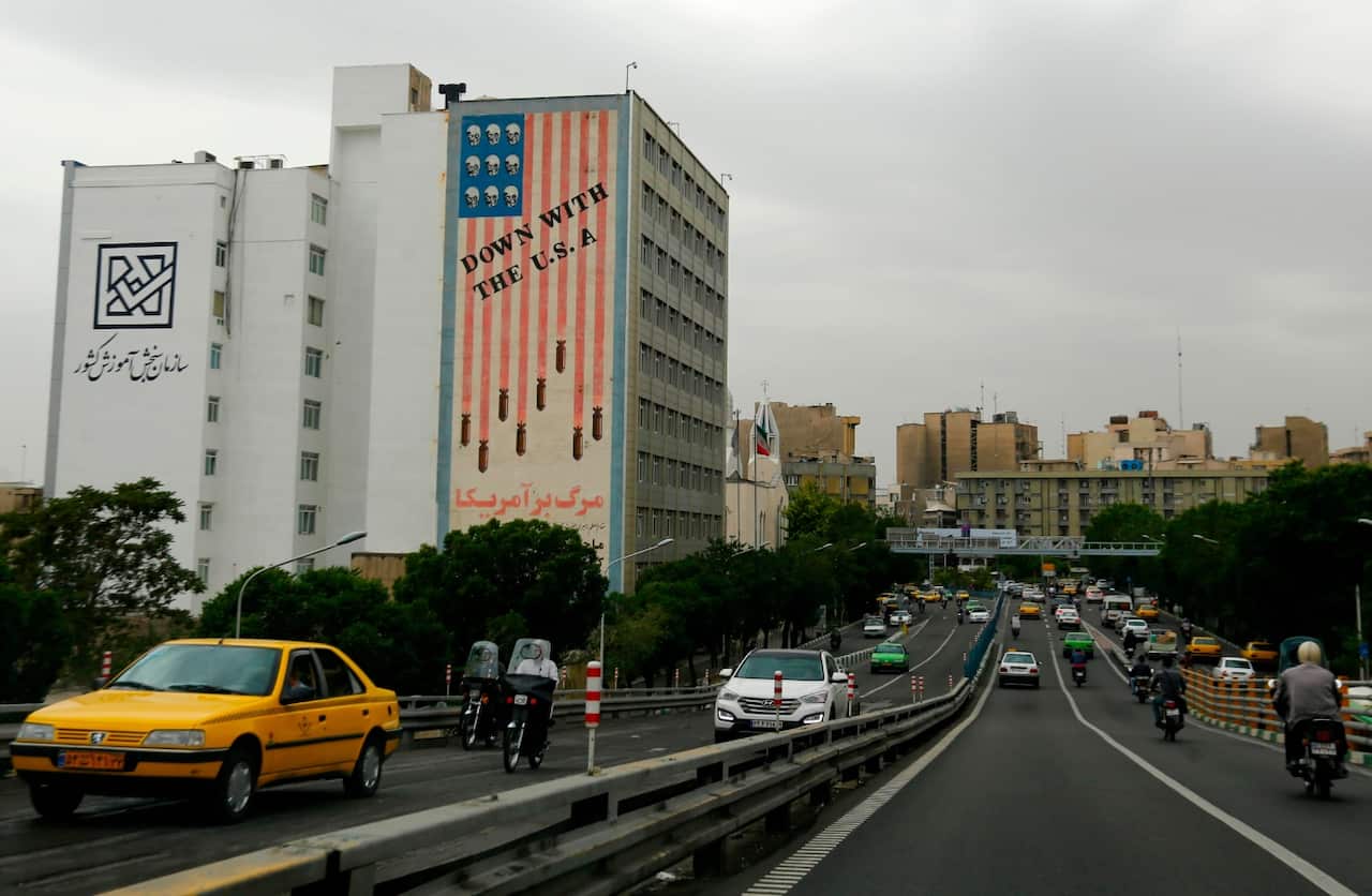 A building bearing an anti-US slogan is seen in the Iranian capital Tehran on May 8, 2018.