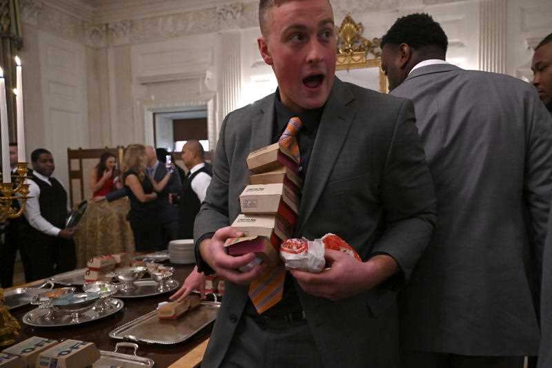 "We have pizzas, we have 300 hamburgers, many, many french fries, all of our favourite foods," Trump told reporters"We have pizzas, we have 300 hamburgers, many, many french fries, all of our favourite foods," Trump told reporters.