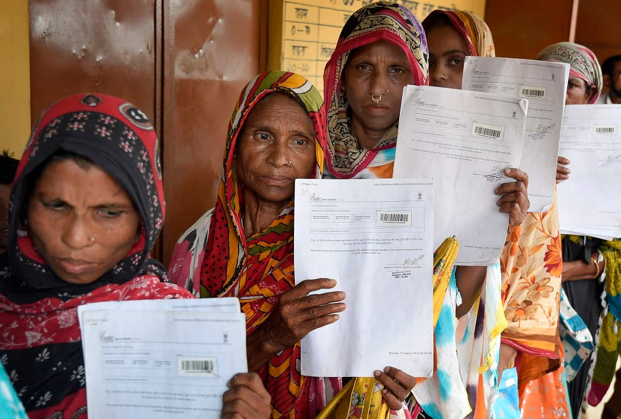 Women wait in queue to verify their names on National Register of Citizens (NRC) draft in Assam.