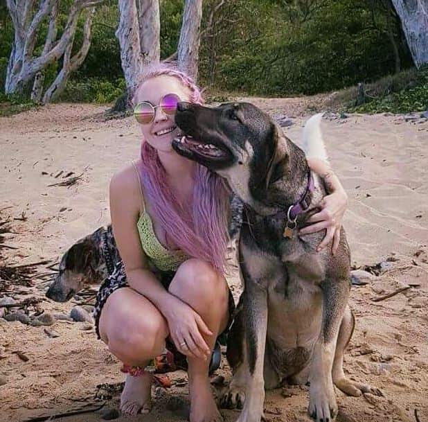 The 24-year-old went to the beach with her dog. The dog was found near her body.