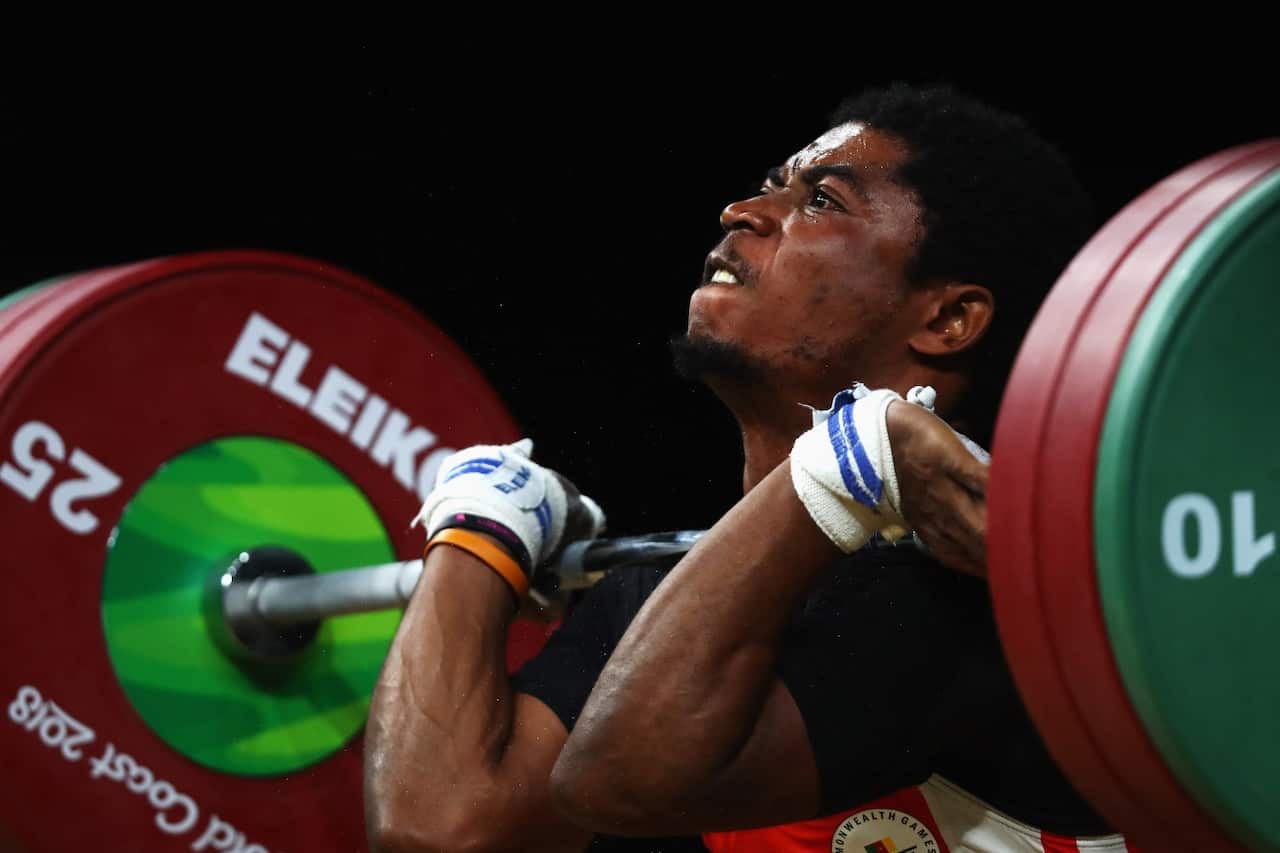 Matam Matam Olivier Heracles of Cameroon competes during the Weightlifting Men's 62kg Final at the Commonwealth Games