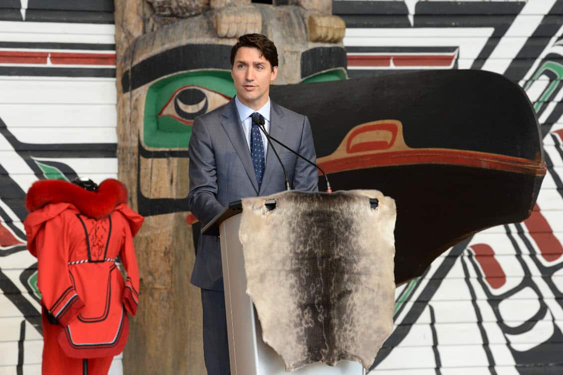 Canadian Prime Minister Justin Trudeau speaks at the closing ceremony for the National Inquiry into Missing and Murdered Indigenous Women and Girls in Gatineau, Canada, Monday, June 3, 2019 (AAP)