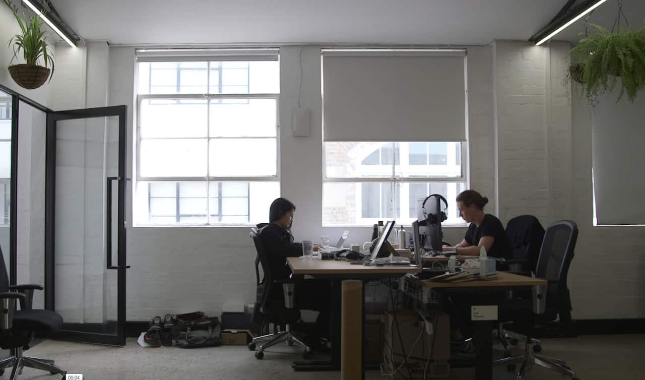 Melanie Perkins at her desk at Canva HQ in Sydney.