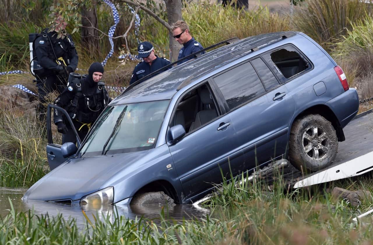 2015 file photo of a 4WD being removed from Lake Gladman in Melbourne. 