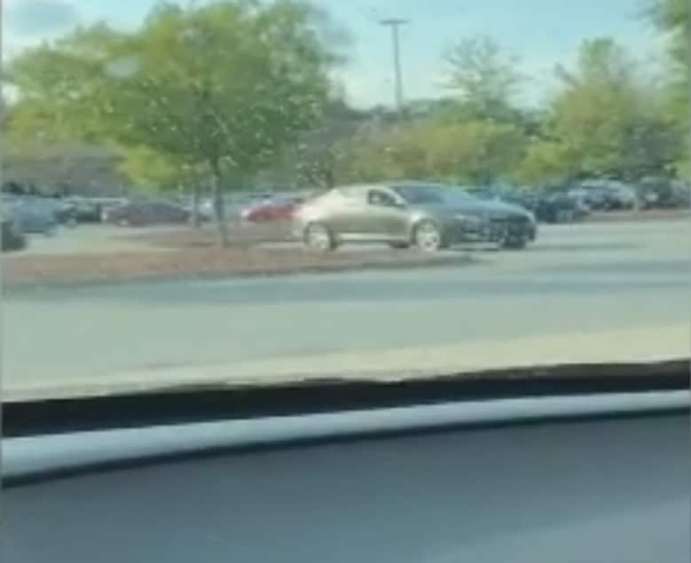 A still from a mobile phone video showing the woman who followed Mr Lewis (CNN)