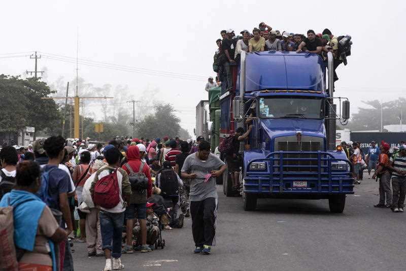 Members of the migrant caravan continue on their way into Mexico. 