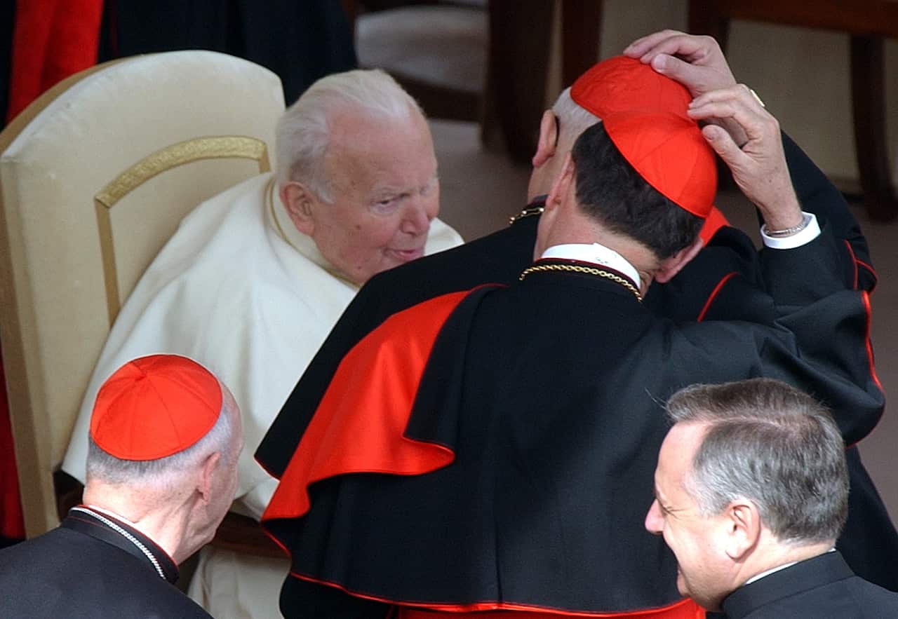 Then-Archbishop of Washington DC, Cardinal Theodore McCarrick is received by then-Pope John Paul II in 2003.