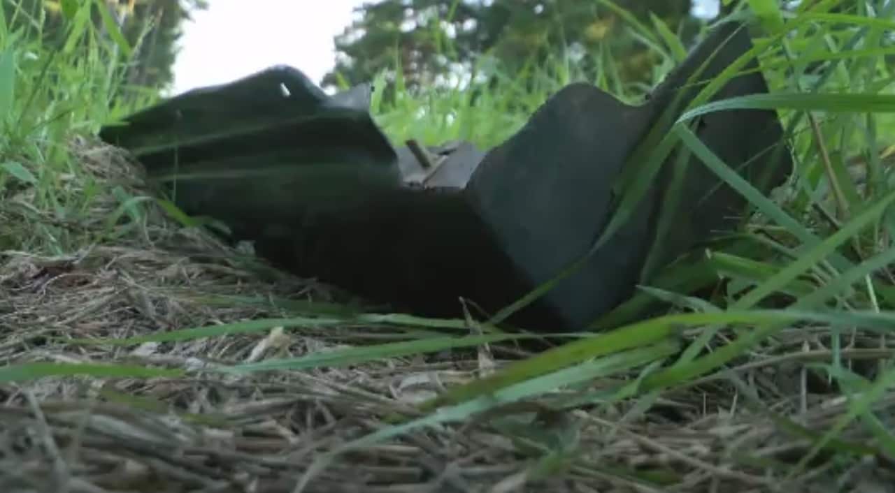 An image of piece of the car at the scene of the accident