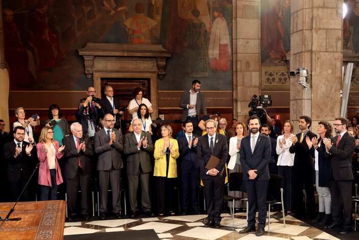 Members of Catalan's regional government at the swearing-in ceremony at Palau de la Generalitat in Barcelona.