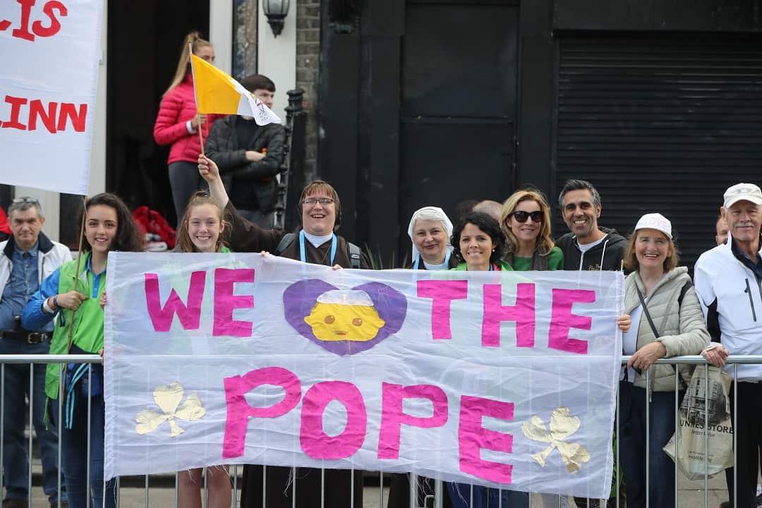Supporters wait to see Pope Francis outside Our Lady of Lourdes Church, Dublin.