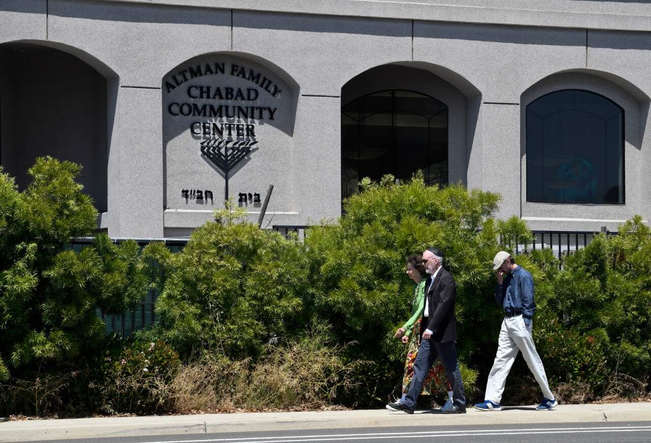 Synagogue members walk outside of the Chabad of Poway Synagogue Saturday, April 27, 2019.