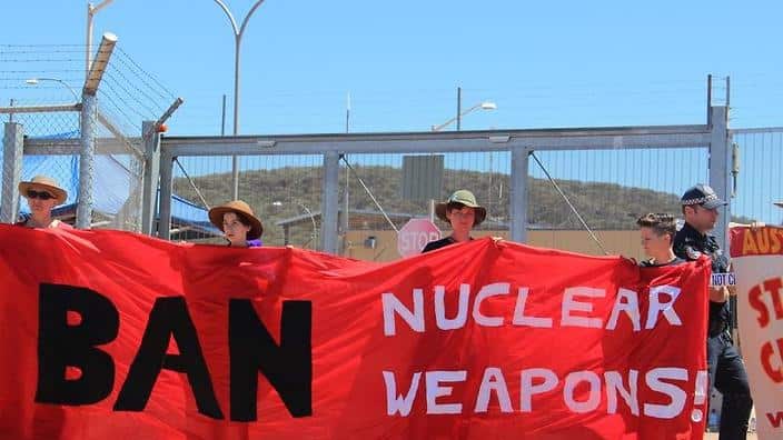ICAN activists protesting at a US military base near Alice Springs in 2016. (AAP)