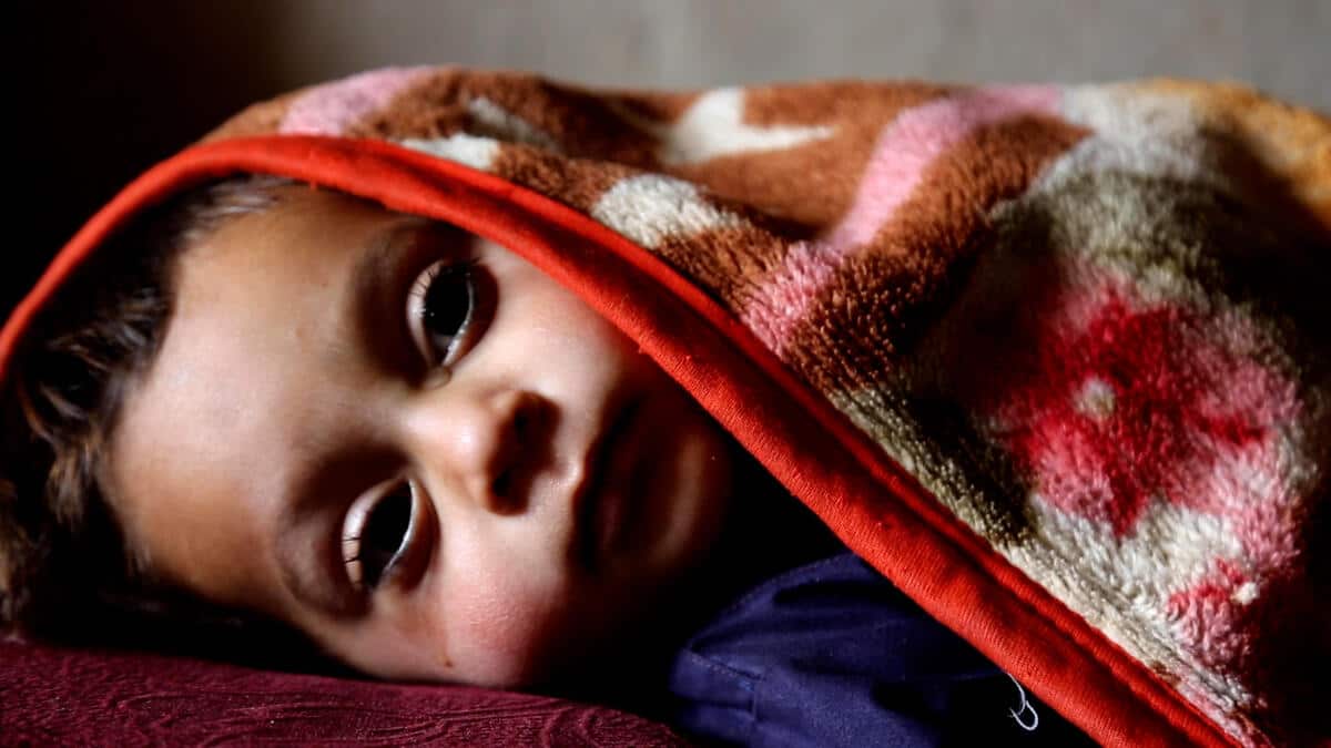 Ara's twin brother Milad. He has been unwell but his mother can't afford to take him to hospital. 