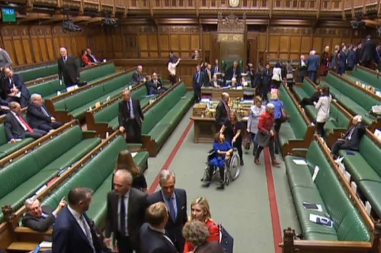 Labour MP Tulip Siddiq is wheeled through the chamber while MPs vote on the Prime Minister's Brexit deal in the House of Commons.