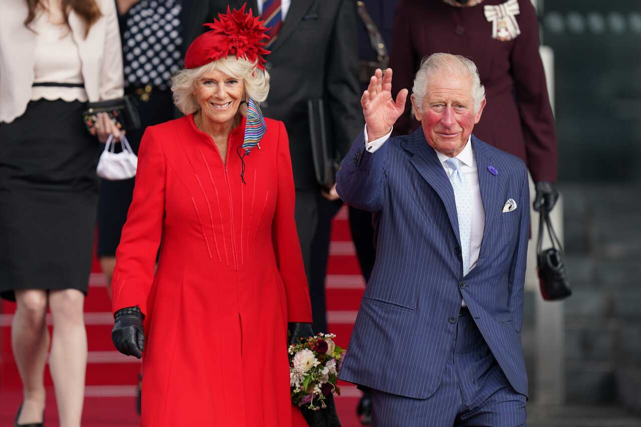 Prince Charles, right, with wife Camilla