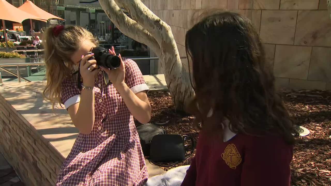 Schoolgirls Charlie and Georgie prefer to be behind the lens.