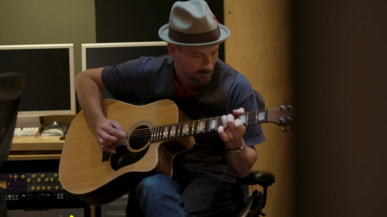 Charlton Hill playing the guitar.