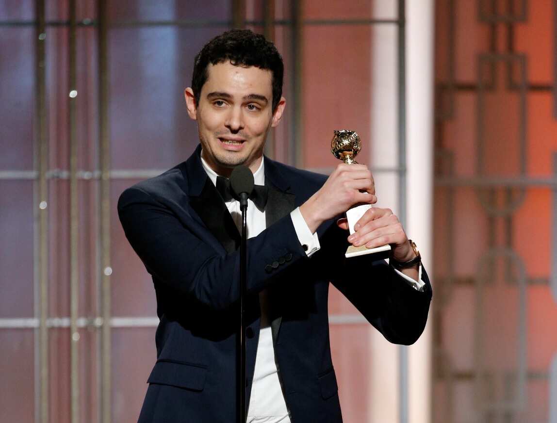 This image released by NBC shows Damien Chazelle with the award for best screenplay for "La La Land," at the 74th Annual Golden Globe Awards (AAP)