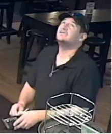 Police initially released this photo of the 33-year-old to the public.