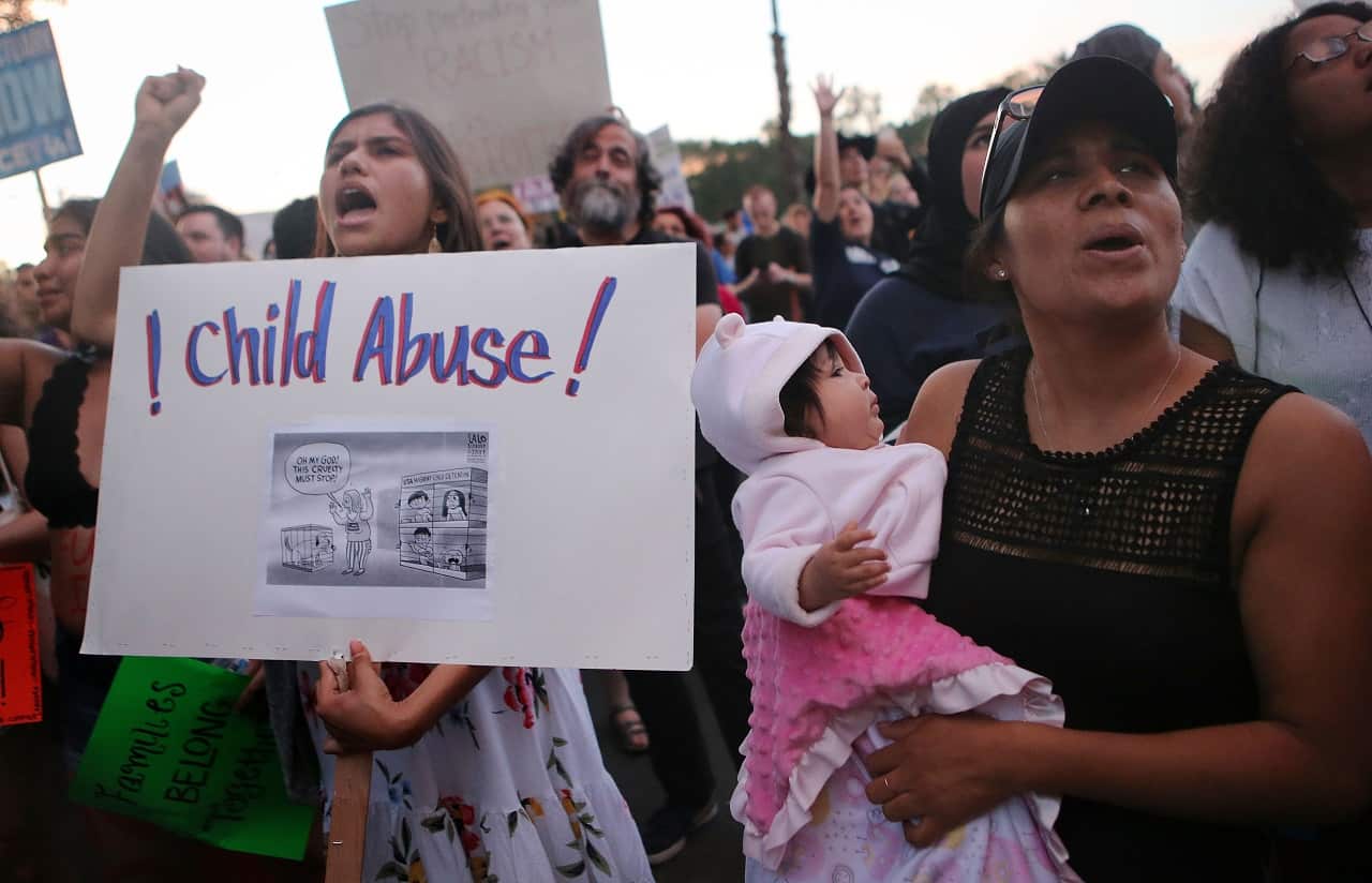 Protesters in LA rally at the 'Families Belong Together March' against the separation of children of immigrants from their families.