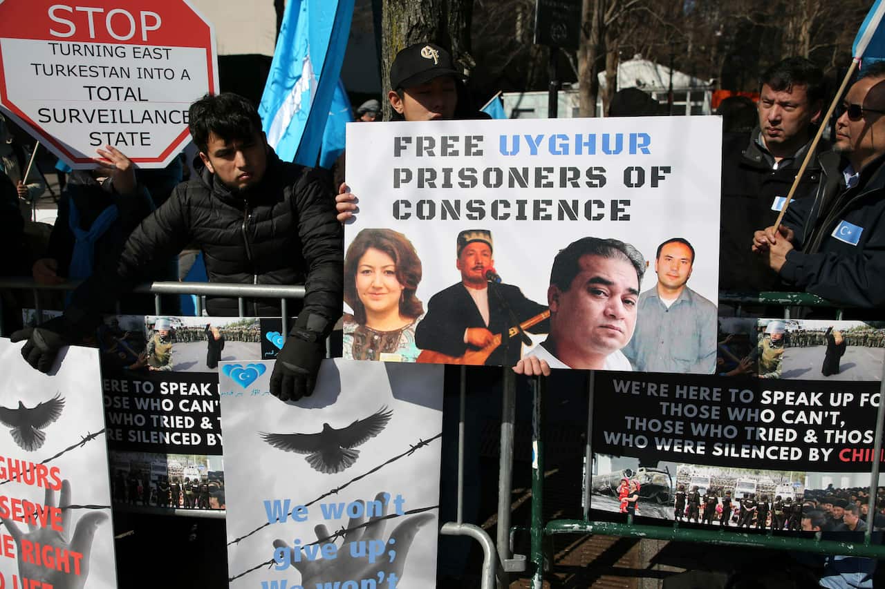 Uighurs rally across the street from United Nations headquarters in New York.