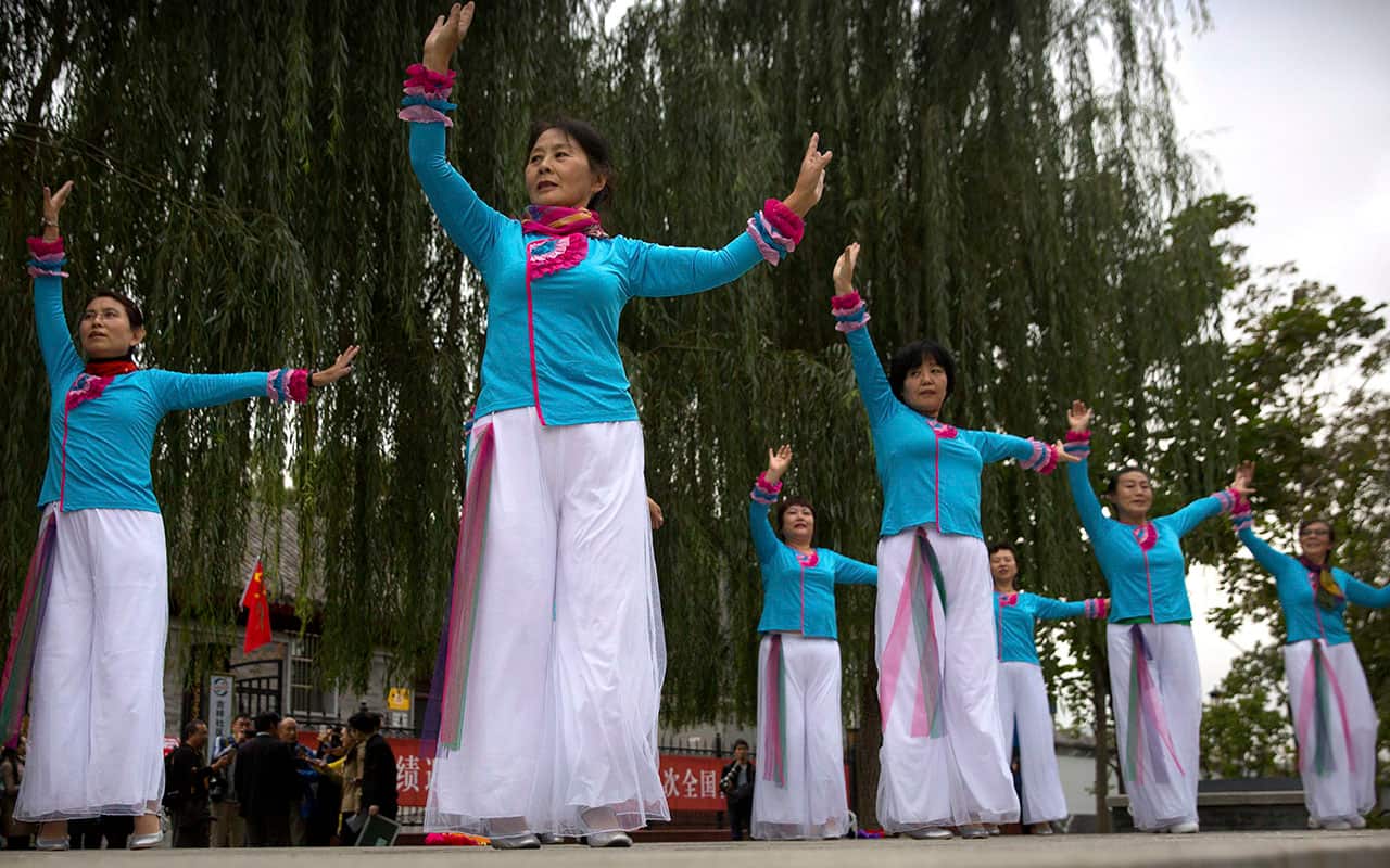Women practice a dance routine in Beijing, China