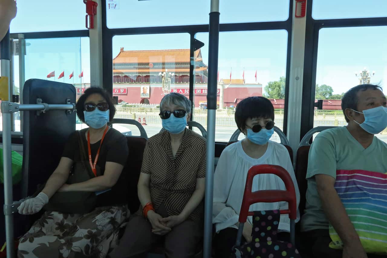 People wears masks in Beijing, China on 14 June, 2020. ( The Yomiuri Shimbun via AP Images )