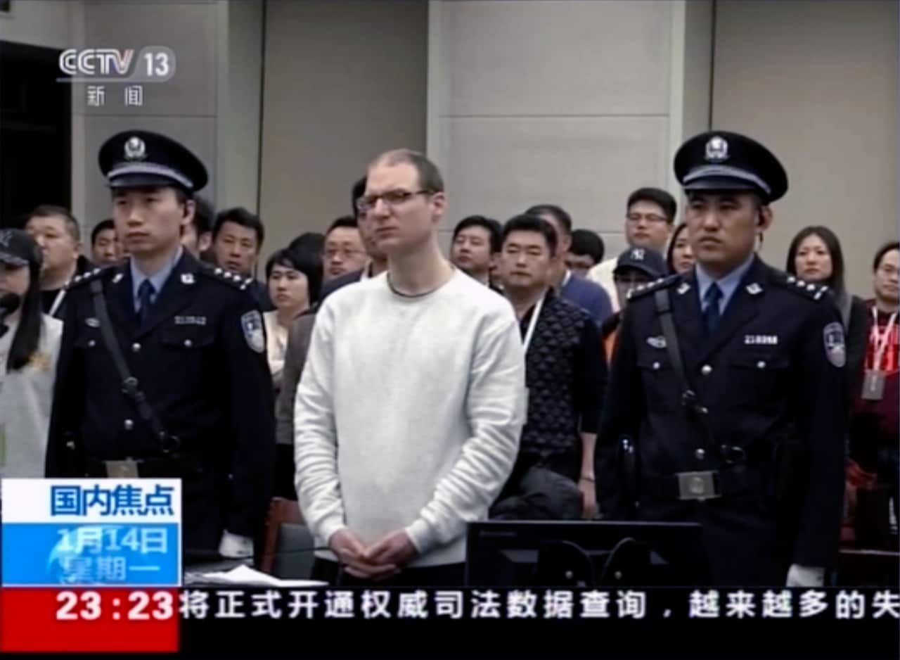Canadian Robert Lloyd Schellenberg attends his retrial at the Dalian Intermediate Peoples Court in Dalian.